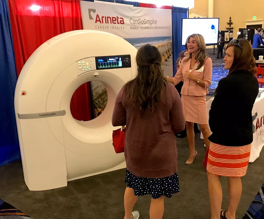 A dedicated cardiac CT scanner made in partnership with GE and Arineta at the 2022 Society of Cardiovascular Computed Tomography (SCCT) annual meeting. This small, compact scanner is designed for use in small rooms and clinics to expand the use of CCTA.