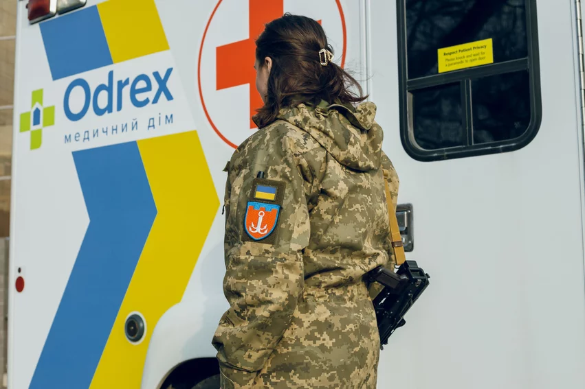 An armed member of a Ukrainian territorial defense unit checks out a new ambulance being donated Odrex Hospital in Odesa, Ukraine. The hospital donated the ambulance to enable the local unit the ability to transfer wounded to the hospital with current state-of-the art technology. Image courtesy of Odrex. #Supportukraine #StandwithUkraine #russiaukrainewar