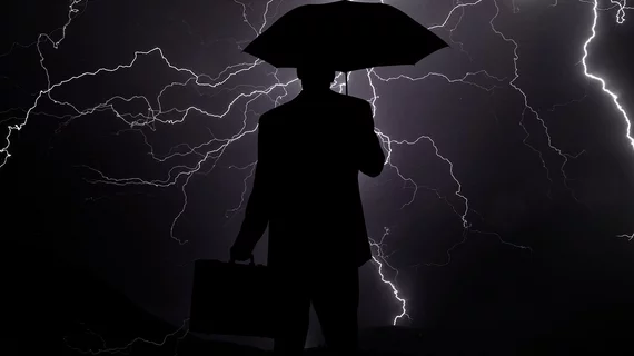 business man storm rain crisis